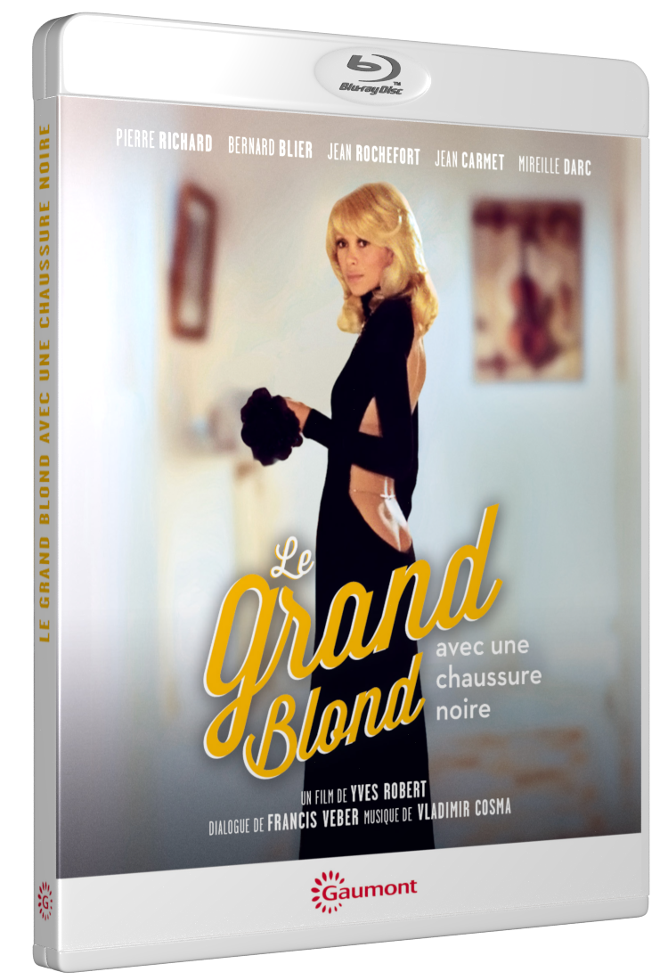 LE GRAND BLOND AVEC UNE CHAUSSURE NOIRE